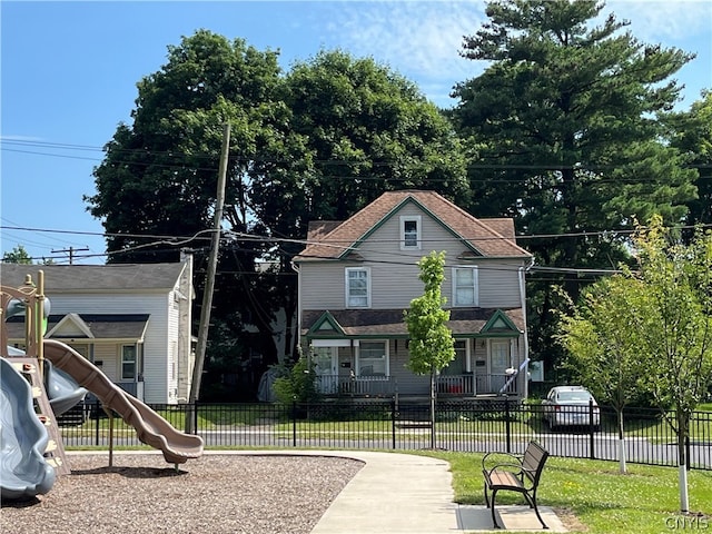 view of jungle gym with a yard