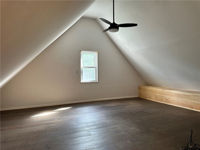 additional living space featuring lofted ceiling, hardwood / wood-style flooring, and ceiling fan