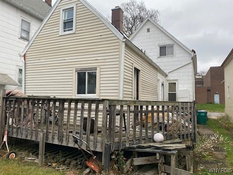 rear view of property with a deck