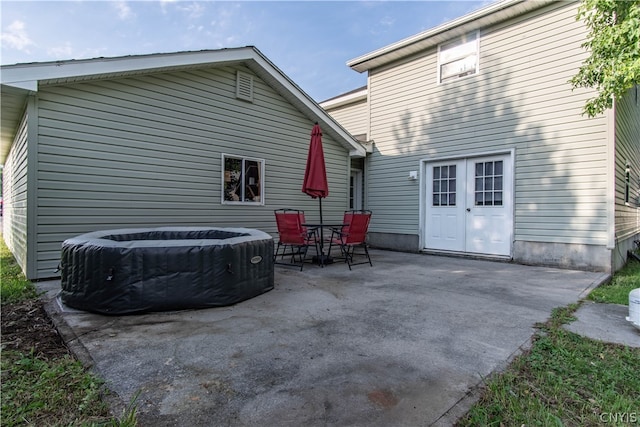 rear view of house with a patio