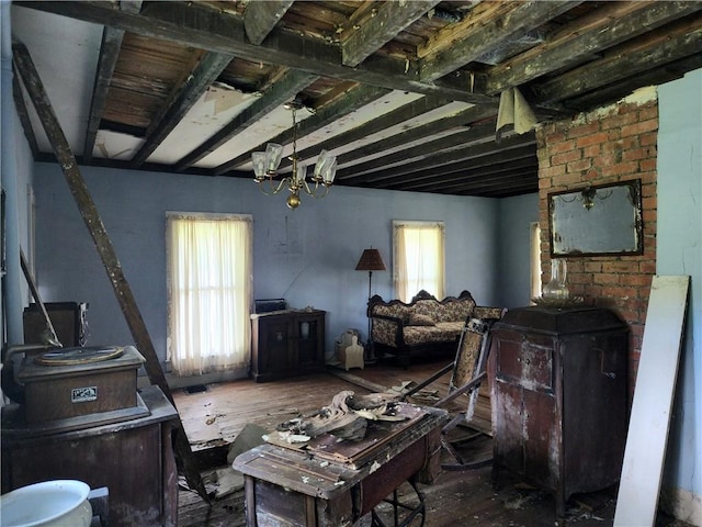 misc room with a notable chandelier and a wealth of natural light