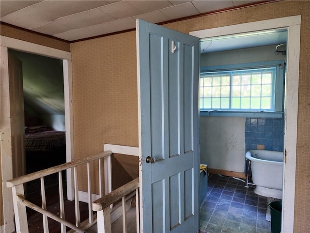 bathroom with crown molding