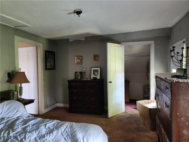 bedroom featuring dark colored carpet