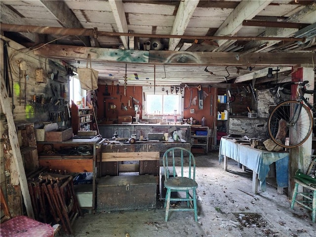 misc room with a workshop area