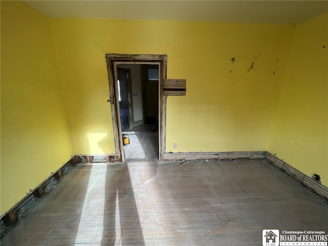 spare room featuring hardwood / wood-style floors