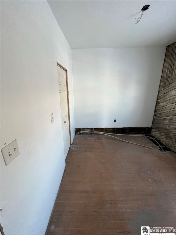 spare room with hardwood / wood-style floors