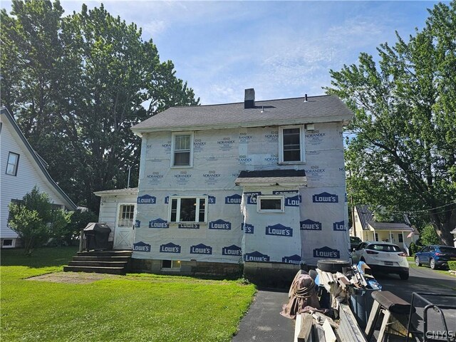 exterior space with a front yard