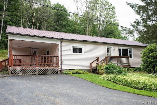 ranch-style house featuring a deck