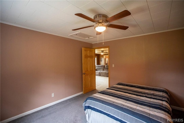 bedroom with carpet floors, ornamental molding, and ceiling fan