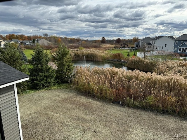 view of yard with a water view