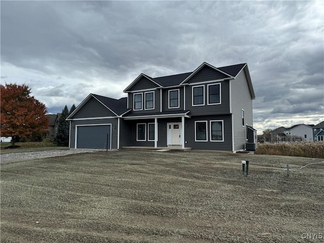 front facade with a garage