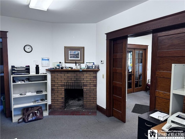 living room featuring carpet floors and a fireplace