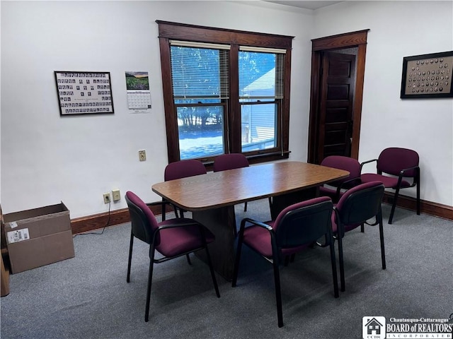 dining space with carpet