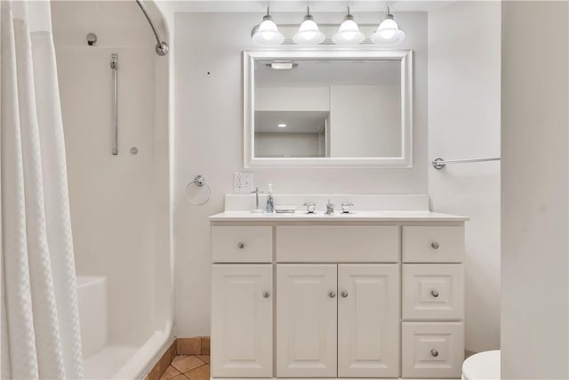 bathroom with vanity, tile patterned floors, and a shower with shower curtain