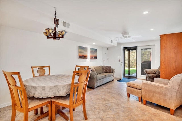 dining space with ceiling fan