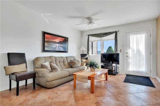 living room with ceiling fan