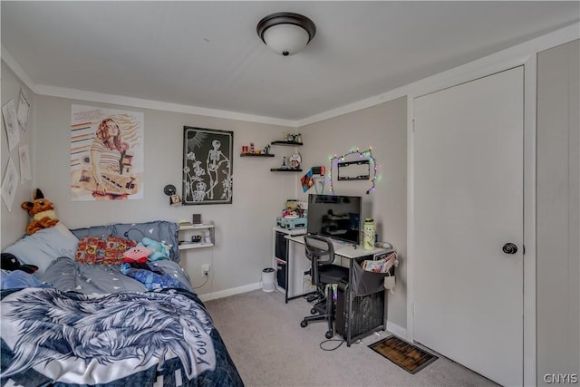 carpeted bedroom with crown molding