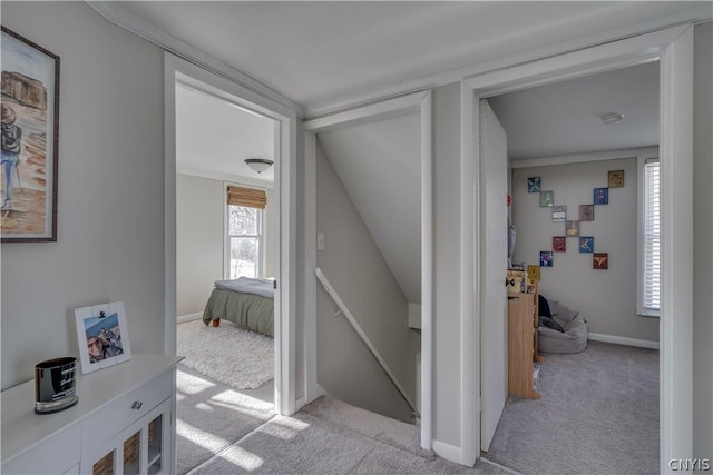 corridor with light colored carpet