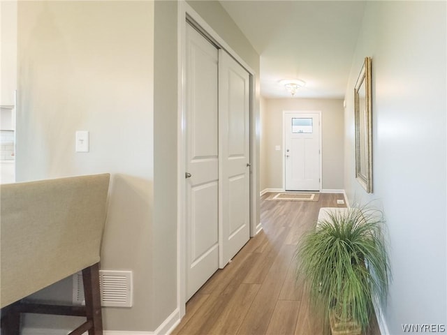 hall featuring light hardwood / wood-style flooring