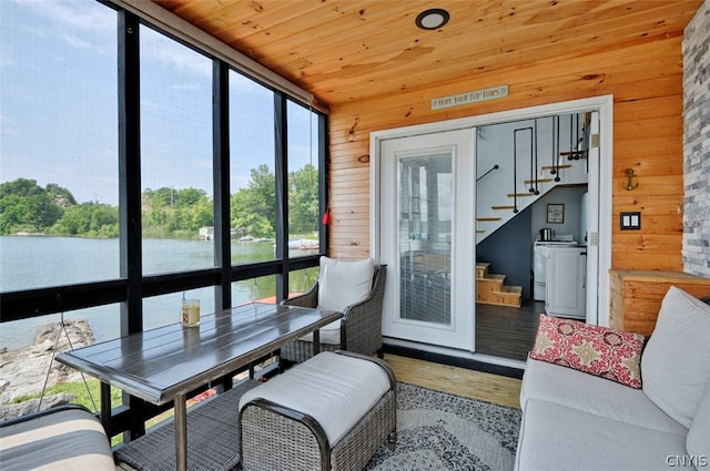 sunroom / solarium with a wealth of natural light and wooden ceiling