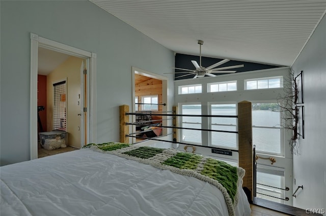 bedroom featuring high vaulted ceiling, multiple windows, and ceiling fan