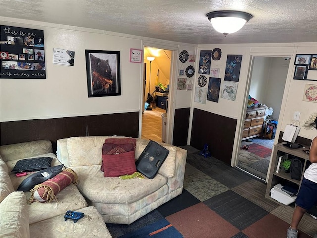 living room with a textured ceiling