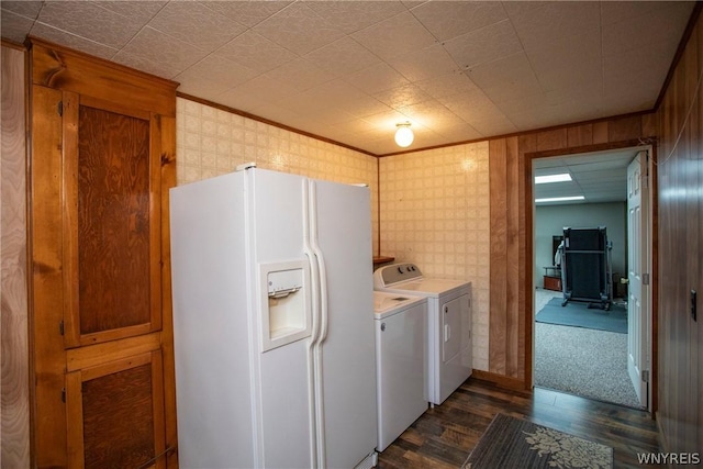 washroom with wallpapered walls, laundry area, washer and clothes dryer, dark wood-type flooring, and crown molding