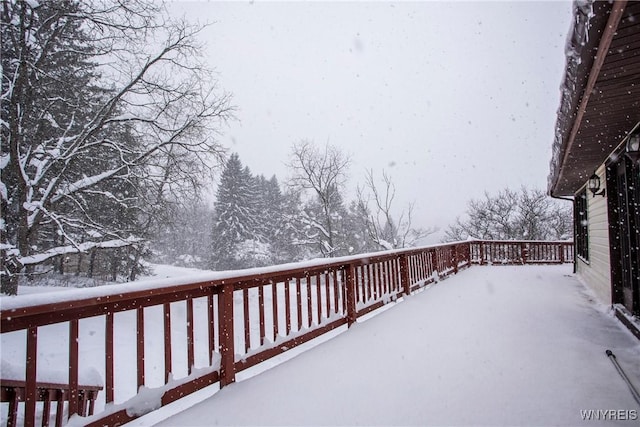 view of snow covered deck