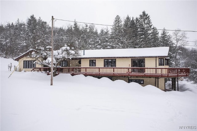 view of front of property with a deck