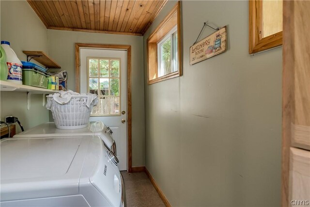 laundry area with cabinets, washer and dryer, wood ceiling, and carpet floors