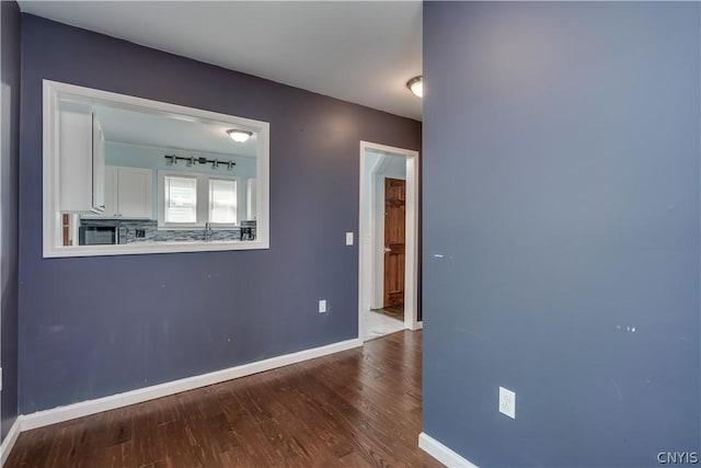 spare room featuring hardwood / wood-style floors