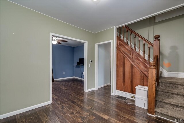 unfurnished room featuring hardwood / wood-style flooring and ceiling fan