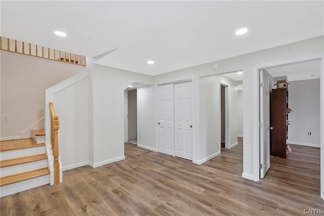 basement featuring hardwood / wood-style floors