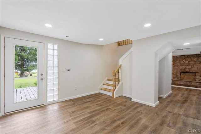 foyer entrance with hardwood / wood-style flooring