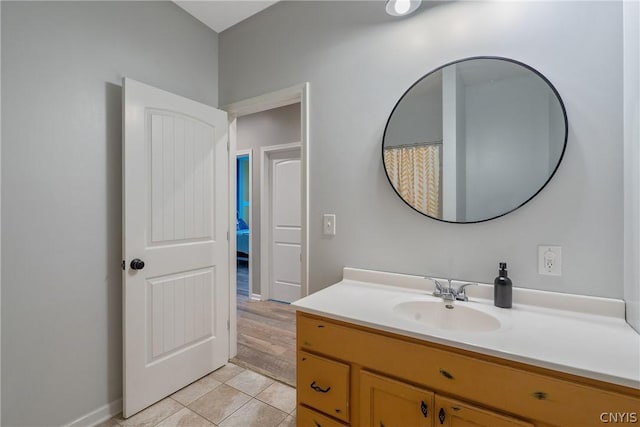 bathroom featuring vanity and tile patterned flooring