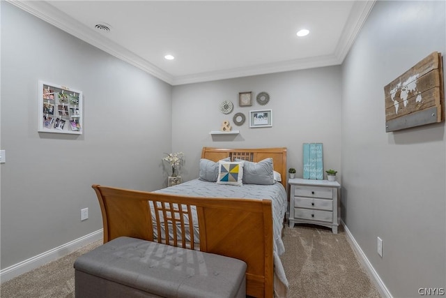 carpeted bedroom featuring crown molding