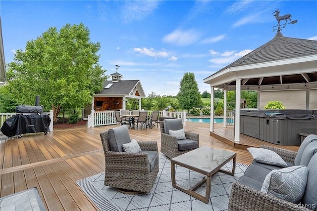 wooden deck featuring a gazebo, outdoor lounge area, a pool with hot tub, and a bar