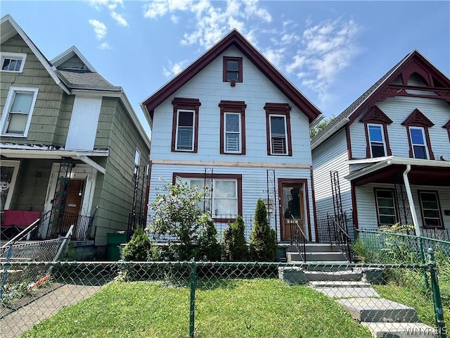 view of front of home with a front yard