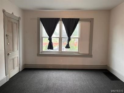 view of carpeted spare room