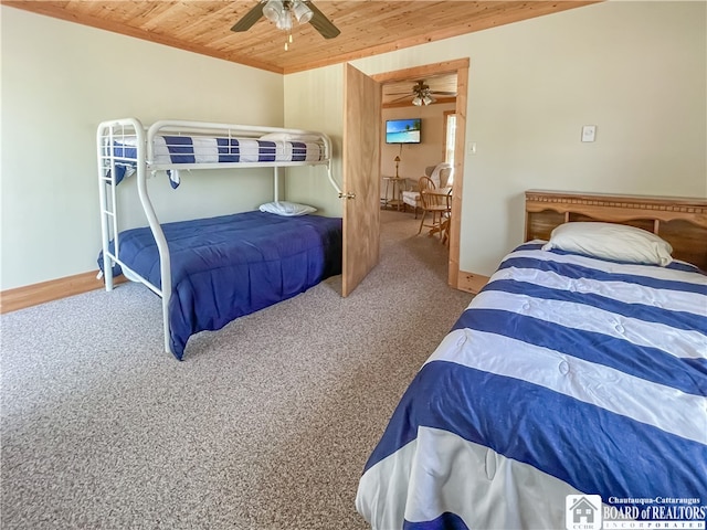 carpeted bedroom featuring wooden ceiling and ceiling fan