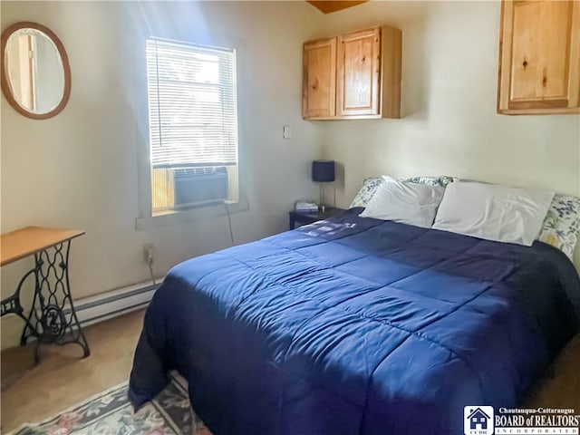 bedroom with a baseboard heating unit, carpet flooring, and cooling unit