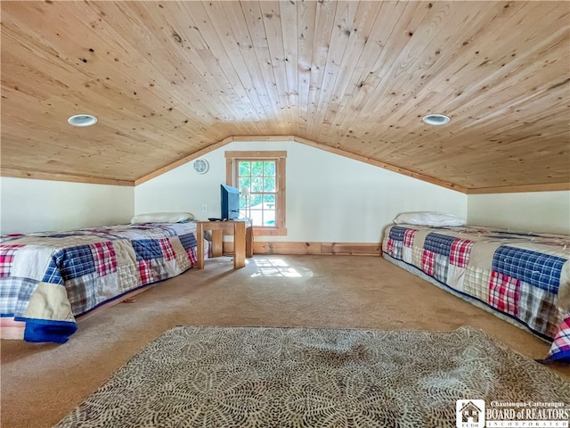 carpeted bedroom featuring vaulted ceiling and wooden ceiling