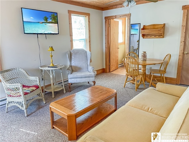 carpeted living room with baseboard heating