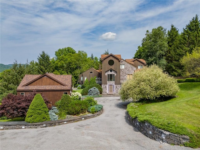 94 Overlook Dr, Andes, NY 13731 - view of front of home with stone siding, a front lawn, and asphalt driveway