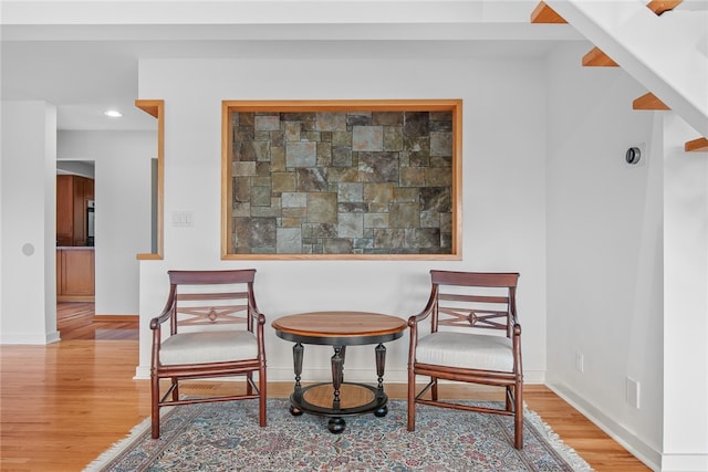 living area featuring hardwood / wood-style flooring