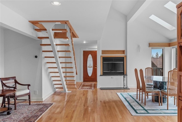94 Overlook Dr, Andes, NY 13731 - dining area with a skylight, stairs, light wood finished floors, recessed lighting, and baseboards