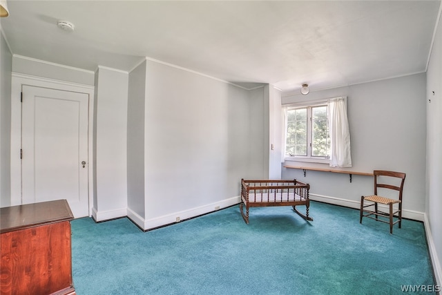 living area with carpet floors and crown molding