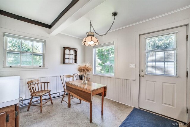 tiled office space featuring crown molding, a baseboard heating unit, and beam ceiling