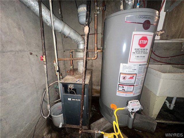 utility room featuring gas water heater