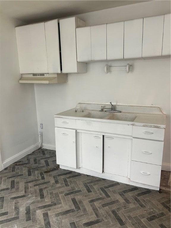 kitchen with white cabinets